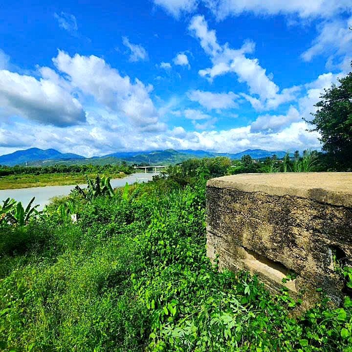 Old citadel wall with river and mountain view near Dien Khanh
